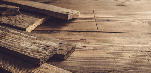 Rustic wooden boards on a table - obrazy, fototapety, plakaty