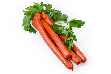 Long thin smoked sausages with parsley twigs on white background