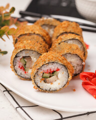 Different rolls and sushi. Asian cuisine.