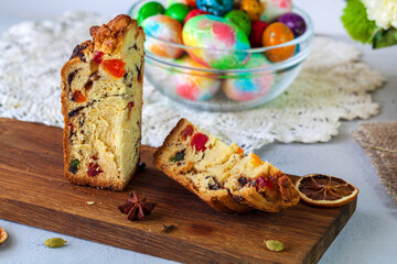 Easter cake Kraffin (Cruffin), with nuts and candied fruit sprinkled with powdered sugar, 2021 trend of the easter cake.