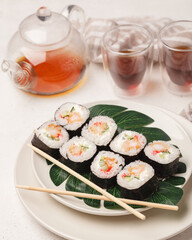 Different rolls and sushi. Asian cuisine.