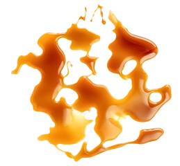 Flowing  Caramel sauce isolated on a white background close up.  Melted  caramel spots. Top view