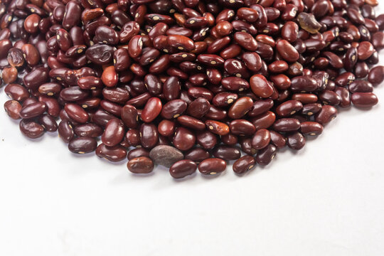 Fresh organic red kidney beans or rajma on white isolated background.