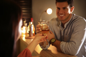 Man and woman flirting with each other in bar