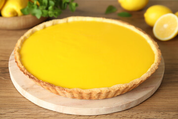 Delicious homemade lemon pie on wooden table
