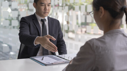 Employer or HR department welcomes new employees, Shaking hands with congratulations or achieving business and income success, selection of new staff representatives, Qualified, Hand shake concept.