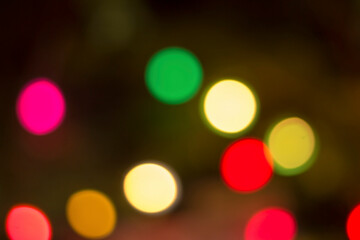 Blurred colorful bokeh lights in the night