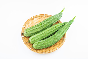 Fresh angular loofah on white background