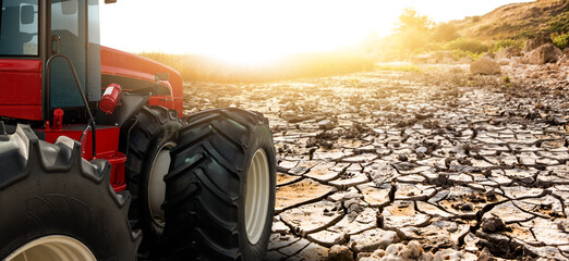 Tractor in the desert. Area of risk farming.
