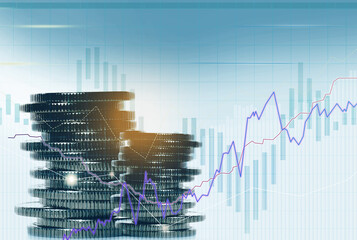 Investment concept. Coins and charts on light background
