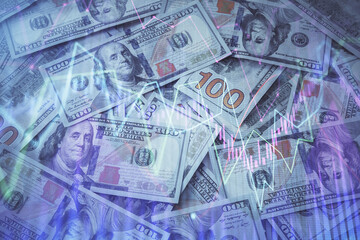 Multi exposure of forex chart drawing over us dollars bill background. Concept of financial success markets.