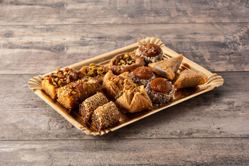 Assortment of Ramadan dessert baklava on wooden table
