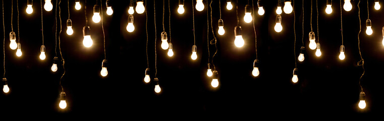 Light bulbs over dark texture