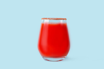 Traditional Mexican cuisine: alcoholic drink Michelada. Cocktail with tomato juice: Bloody mary, sangrita, ceviche mary on blue background