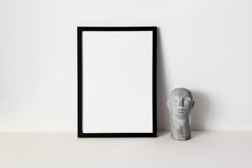 Black photo frame mockup with grey head