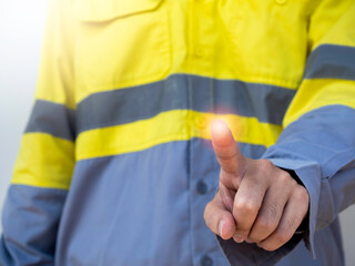 Engineering people wearing yellow high visibility jacket.
