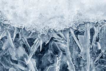 Ice background texture. Frozen water in various geometric abstract shapes. Seasonal natural effect....
