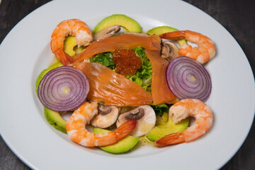 Healthy breakfast with salmon, salad, avocado mushroom, salmon egg, red onion, High quality photo