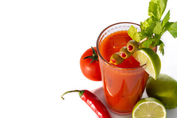 Bloody Mary cocktail in glass and ingredients isolated on white background. Copy space