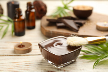 Cosmetic product for spa body wraps on white wooden background