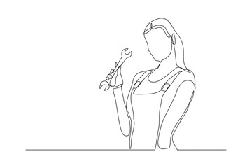 Continuous line drawing of young female mechanic pose holding set of wrench. Single one line art of professional job profession minimalist concept. vector illustration