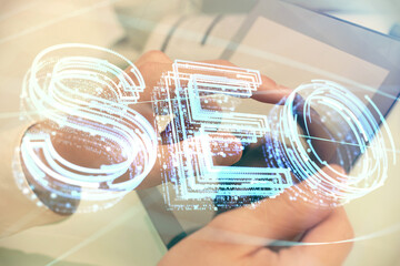 Multi exposure of man's hands holding and using a digital device and seo drawing. search...