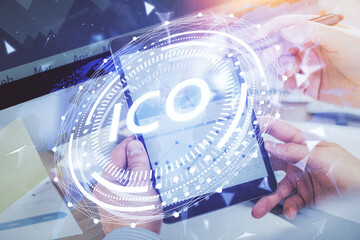 Double exposure of man's hands holding and using a phone and crypto currency blockchain theme drawing.