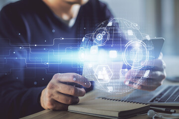 Double exposure of man's hands holding and using a phone and social network theme drawing.