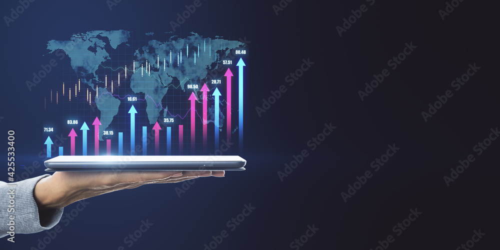 Poster Global trading concept with digital tablet on hand with digital world map and growing arrows on dark blank background. Mock up