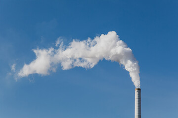 smoke get out of industrial chimney is a symbol for climate change and pollution and shows not...