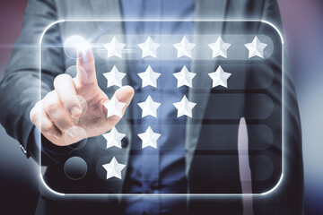 Customer review rating concept with man finger on digital touch screen with rows stars