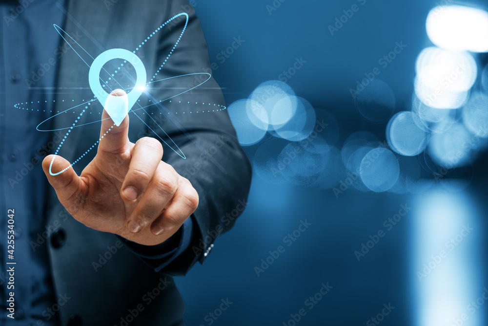 Poster geo locate and navigation concept with finger on digital screen with glowing pinpoint icon