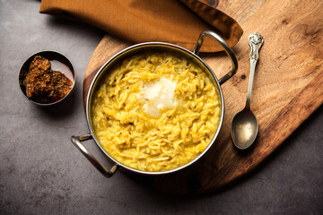 Tasty Dal Khichadi made using clarified butter or desi ghee, Indian food
