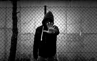 Foto op Aluminium Young street gang with mask © celiafoto