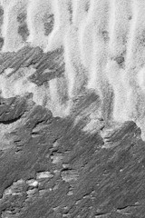 Intricate patterns form in the sand