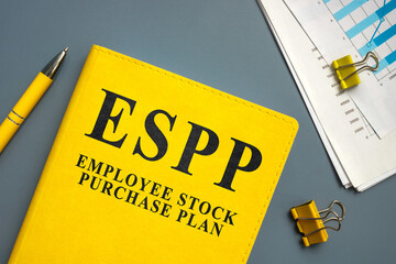 Employee Stock Purchase Plan ESPP and papers with charts and pen.