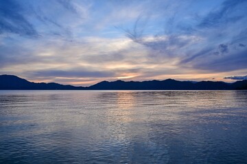田沢湖と夕焼けのコラボ情景＠秋田