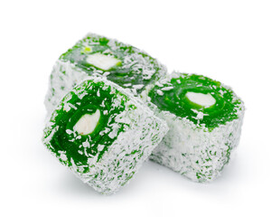 Close up of green Turkish delight sweets isolated on white