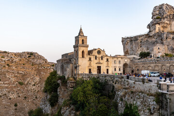 Fototapeta premium View at Church of San Pietro caveoso and on the top of the hill of Church of Saint Mary of Idris in Matera, Basilicata, Italy