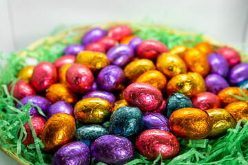Fototapeta na wymiar chocolate easter eggs in a basket
