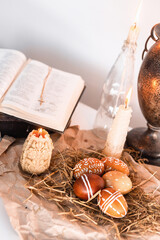candles, paited eggs and bible. . easter at home