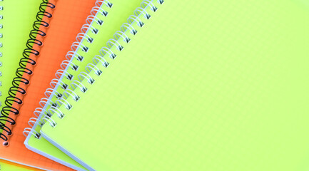 School notebooks with spiral spring and color cover. Back to school soon. Stationery. Place for...
