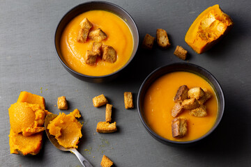 Pumpkin soup served with croutons