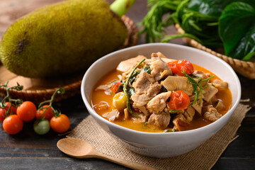 Northern Thai food (Kang Kanoon), Spicy young jackfruit soup with pork in a bowl on wooden table