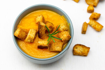 Pumpkin soup served with croutons