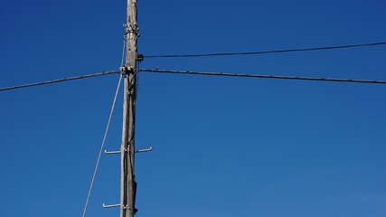 old wooden telephone pole