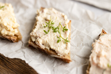 variation of spreads on sourdough rye bread with cress