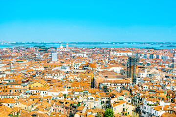 Obraz premium Venice old historical centre with buildings with red tiled roofs, churches and bell tower, Italy