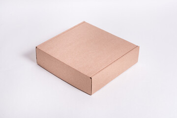 Brown cardboard flat box on white background