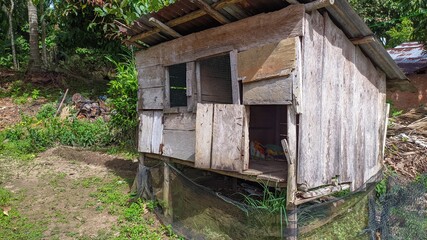 Old wooden chicken coop, old house of hens, old rustic chicken coop © Yan